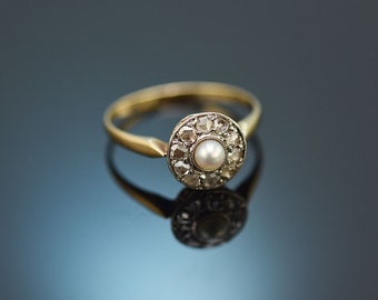 Antiker ring mit natur perle und diamant rosen gold 585 platin um 1900