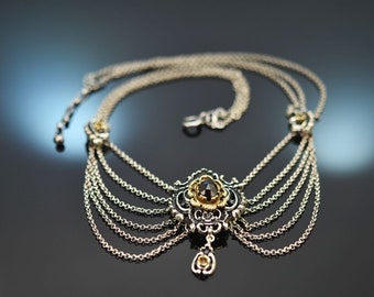 Pretty traditional necklace with garnet made of partially gold-plated silver 835 around 1960