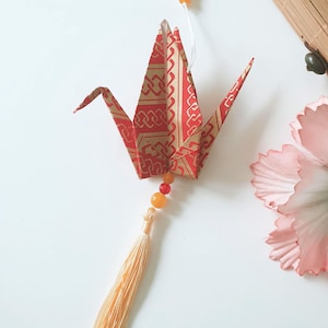 Decorative hanging pendant with a lucky origami crane