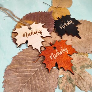 maple place cards
maple leaves tags
maple name tags bulk
custom maple cards
engraved place tags
thanksgiving cards
thanksgiving favors
fall name cards bulk
christmas ornaments
family ornaments
fall table decor
christmas tree decor
friendsgiving gifts