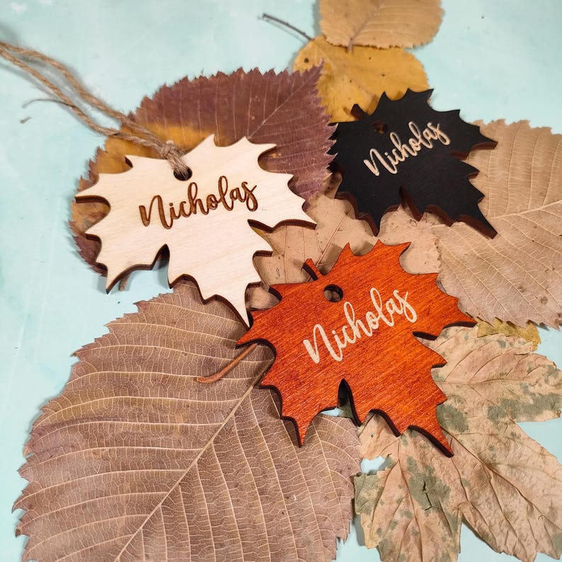 maple place cards
maple leaves tags
maple name tags bulk
custom maple cards
engraved place tags
thanksgiving cards
thanksgiving favors
fall name cards bulk
christmas ornaments
family ornaments
fall table decor
christmas tree decor
friendsgiving gifts