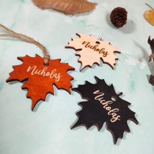 maple place cards
maple leaves tags
maple name tags bulk
custom maple cards
engraved place tags
thanksgiving cards
thanksgiving favors
fall name cards bulk
christmas ornaments
family ornaments
fall table decor
christmas tree decor
friendsgiving gifts