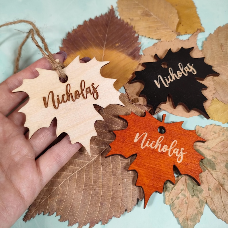 maple place cards
maple leaves tags
maple name tags bulk
custom maple cards
engraved place tags
thanksgiving cards
thanksgiving favors
fall name cards bulk
christmas ornaments
family ornaments
fall table decor
christmas tree decor
friendsgiving gifts