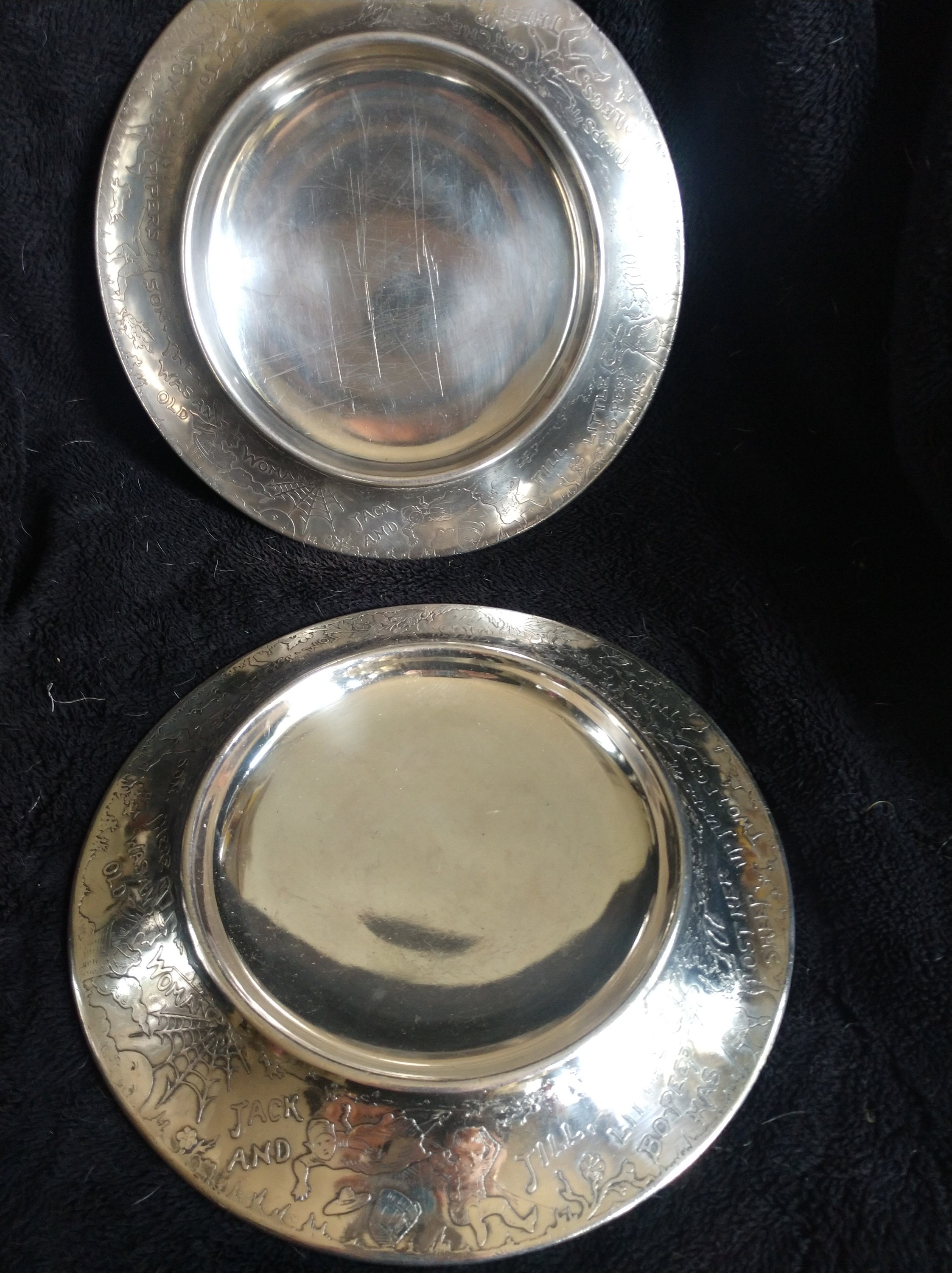 Two antique child's feeding plates Homan circa 1890