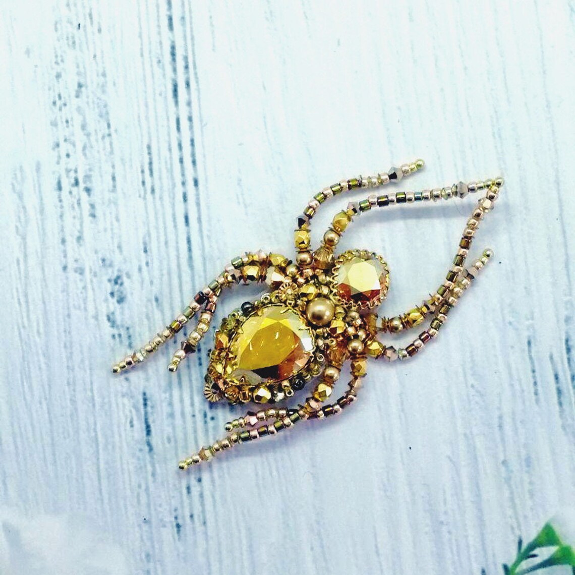 Gold spider bead brooch with Swarovski crystals | Etsy