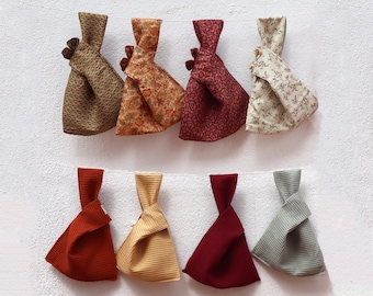 Waffle cotton and printed silk knot bag