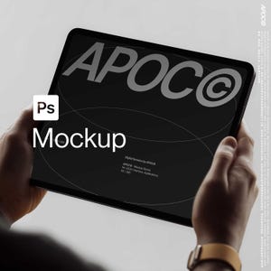 May include: A black tablet mockup held by hands, displaying the word "APOCO" in large, white letters. The word "Mockup" is also visible. The tablet screen features a dark background with a circular design.