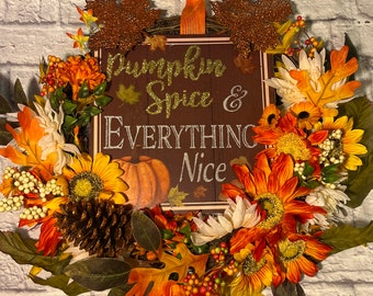 Ghirlanda floreale autunnale: decorazioni rustiche al gusto di zucca e spezie