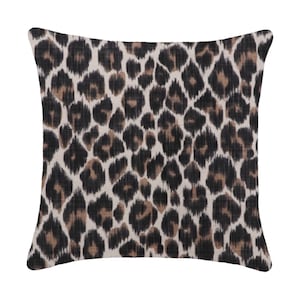 May include: A square throw pillow with a brown and black leopard print pattern.
