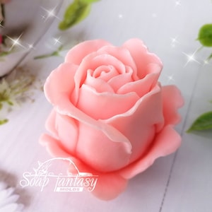 May include: A pink rose soap mold, perfect for creating realistic-looking soap roses. The mold is made of high-quality silicone and is easy to use and clean.