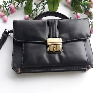Bolso de muñeca vintage para hombre, embrague para hombre de cuero negro, bolso de bolso para hombre, bolso masculino de cuero de la década de 1980, regalo accesorio de oficina para hombre, bolso pequeño