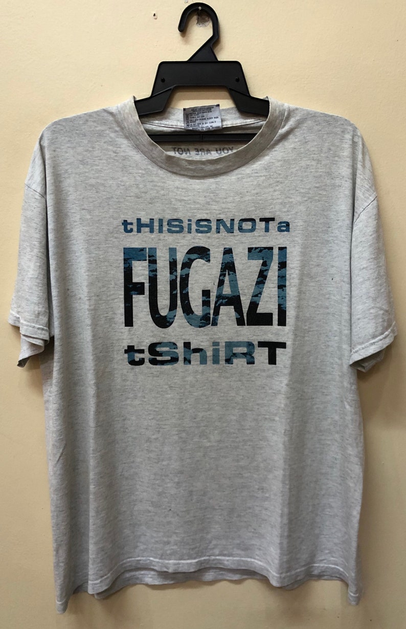 This Is Not A Fugazi T Shirt
 Vintage 90s This in Not A Fugazi T Shirt Ramones Black Flag