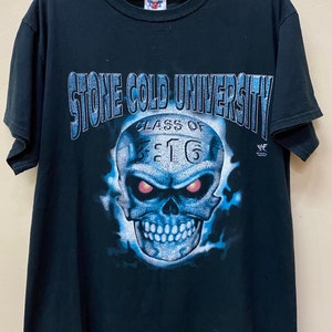 May include: Black t-shirt with a blue and white skull graphic. The skull has red eyes and the text "Stone Cold University Class of 3:16" above it. The WWF logo is in the bottom right corner.
