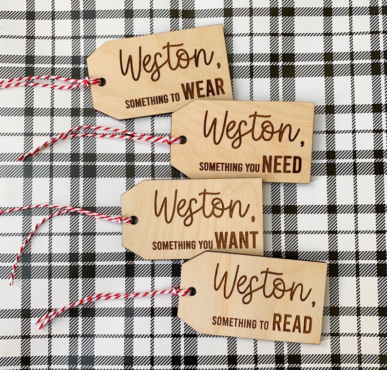 May include: Four wooden gift tags with the name Weston and the words "Something to Wear", "Something You Need", "Something You Want", and "Something to Read".