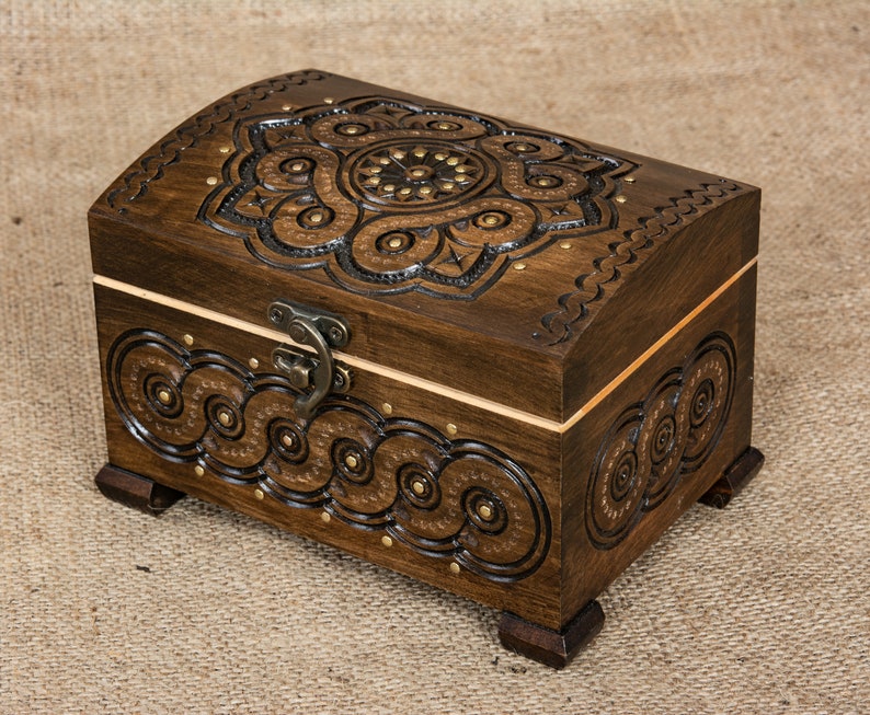 Small wooden jewelry box with hinget lid hand carved from walnut wood