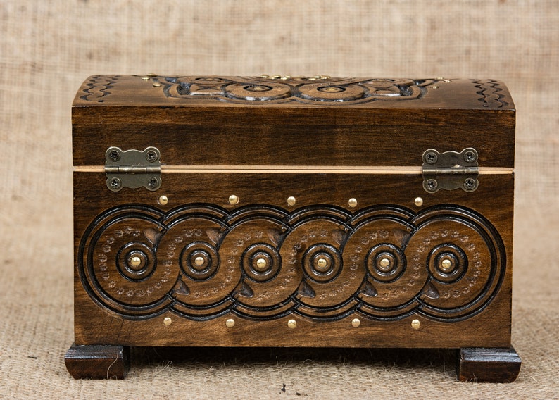 Small wooden jewelry box with hinget lid hand carved from walnut wood