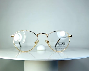 Lunettes de vue LUXOTTICA ovales Montures plaquées or New Old Stock