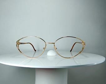 Eyeglasses CHRISTIAN DIOR Gold plated oval frames iconic vintage