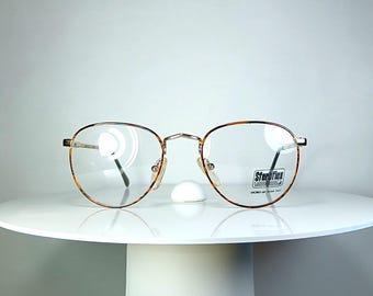 Lunettes de vue LUXOTTICA ovales Montures plaquées or New Old Stock