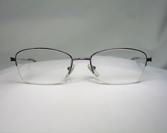 Alain Afflelou lunettes demi jante alliage de titane ovale