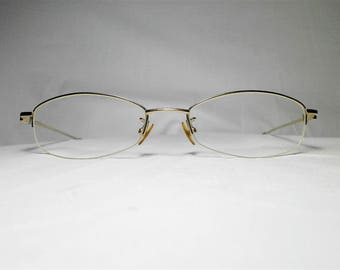 Valentino Rudy Italy, gold plated Titanium half rim, oval, women's eyeglasses, frames, vintage