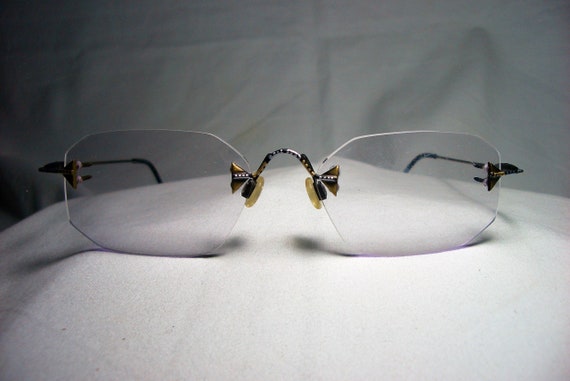 puma rimless glasses