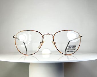 Lunettes de vue LUXOTTICA ovales Montures plaquées or New Old Stock