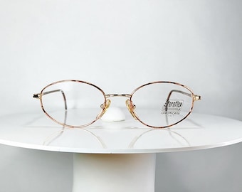 Eyeglasses LUXOTTICA oval Gold plated frames New Old Stock