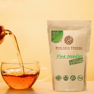 May include: A brown paper bag with a white label that says "Polana Herbs Pine Needles Organic Product". The bag has a green logo with the text "It's what's on the inside that matters". The bag also has four green labels that say "Organic", "Natural", "Vegan", and "Gluten Free".