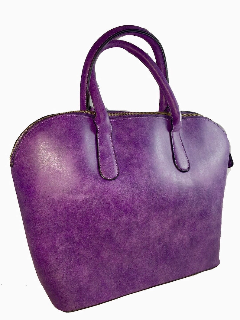 purple faux leather tote bag with gold embellishment