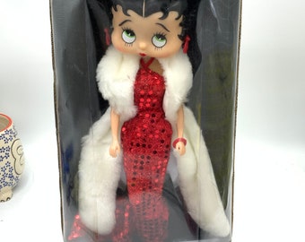 Gorgeous collectible vintage Betty Boop doll fashion doll, red and white dress. With the original box.