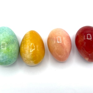 Gorgeous collectible marble eggs, aqua, salmon, amber and yellow tone your choice.