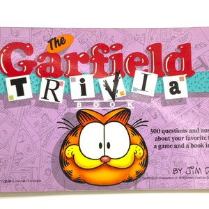 Gorgeous collectible and vintage Garfield trivia book  and throw his weight around, Jim Davis, paperback