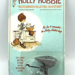 Gorgeous collectible and vintage die-cast metal old fashion scales by Holly Hobbie. Sealed