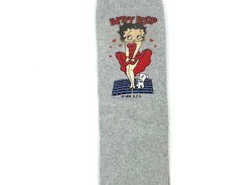 Gorgeous collectible and vintage Betty boop gray tone socks. With red banding at the top instead of black.