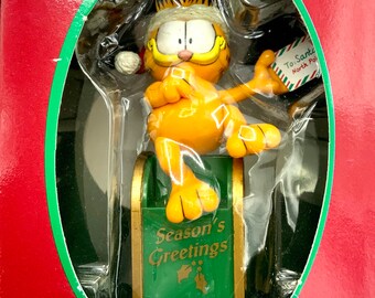 Gorgeous collectible and vintage ornament as Garfield with the mail, Santa letters, trim-a-tree ornament . With the original box.