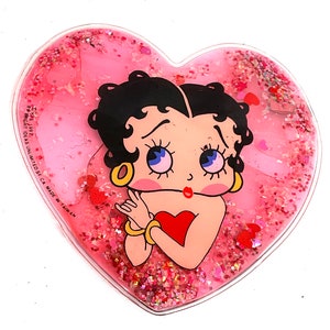 Gorgeous collectible and vintage Betty Boop red heart plastic wallet, small.