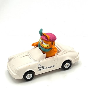 Gorgeous collectible and vintage Garfield with a white car, cat, king of the road, Comicland, orange, figurine, toy.