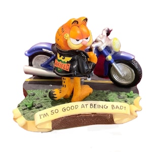 Vintage Garfield with motorcycle, I’m so good at being bad, motorcycle cat, orange, figurine.