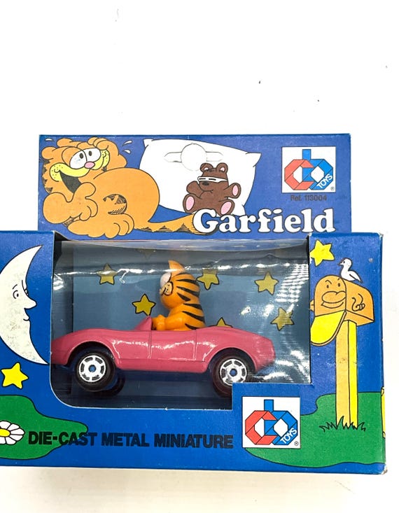 Gorgeous Vintage and Collectible Garfield With a Pink Car Die-cast