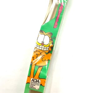 Magnifique brosse à dents Garfield de collection et vintage, toujours dans son emballage d'origine, blanche, taille enfant.