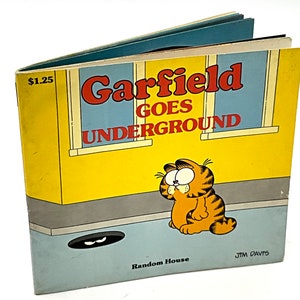 Gorgeous collectible and vintage Garfield goes underground, Jim Davis.