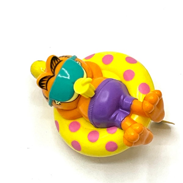 Gorgeous collectible and vintage Garfield  movable tail, water toy, cat, orange, lifeguard.