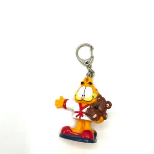 Gorgeous collectible and vintage  Garfield with Pooky  keychain by Russell.