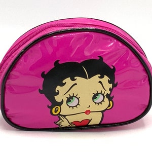 Gorgeous collectible and vintage Betty Boop pink plastic purse.