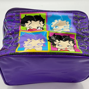 Gorgeous collectible and vintage plastic purple Betty Boop lunchbox.