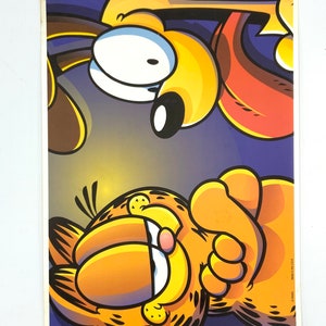 Gorgeous collectible and vintage Garfield and Odie placemat, plastic.