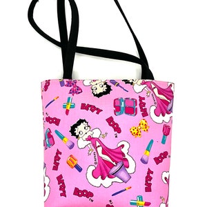 Gorgeous pink Betty Boop purse, sexy, colorful.