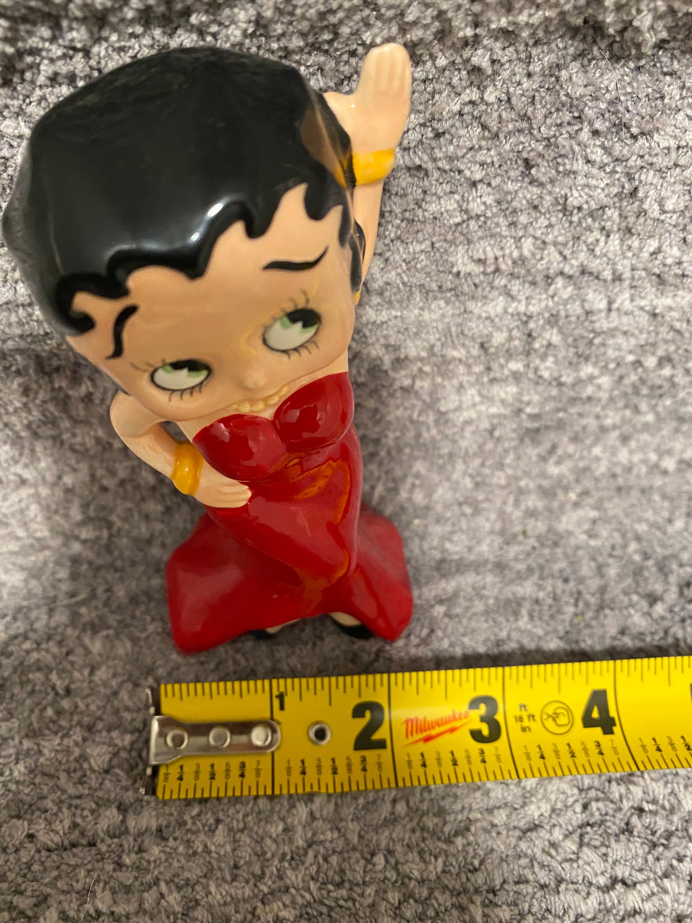 Statue en résine Betty Boop en robe de soirée orange 120 cm : H, 120 x L, 60 x l, 50 cm
