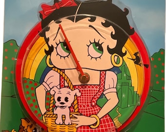 Gorgeous collectible  Betty Boop as Dorothy clock, 3D, Animated Hula wall clock, move leg swing, new.